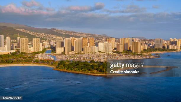 view of cityscape with ala moana regional park - ala moana beach stock pictures, royalty-free photos & images