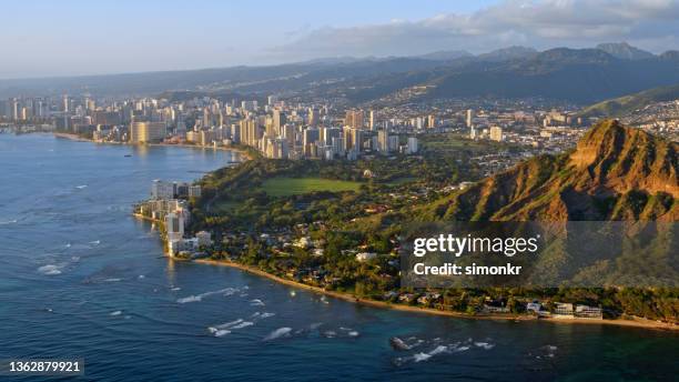 view of diamond head with modern city - diamond head stock pictures, royalty-free photos & images