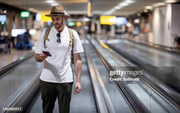 double checking his departure gate - double check stock pictures, royalty-free photos & images