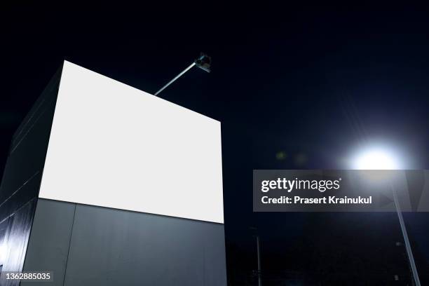 billboard screen at night. mockup - billboard night photos et images de collection
