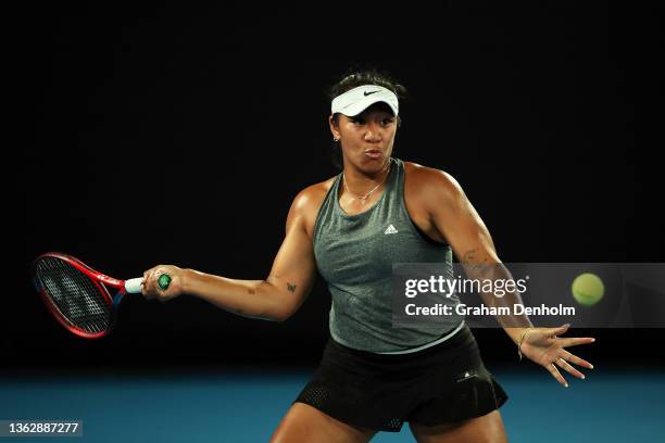 Destanee Aiava of Australia plays a forehand in her match against Simona Halep of Romania during day three of the Melbourne Summer Events at...