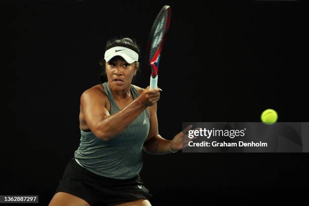 Destanee Aiava of Australia plays a forehand in her match against Simona Halep of Romania during day three of the Melbourne Summer Events at...