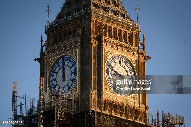 Two of the clock faces on Queen Elizabeth Tower, commonly referred to as Big Ben, are seen as renovation work nears completion, on January 05, 2022...