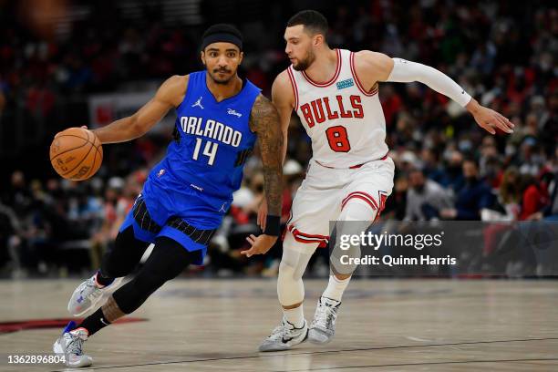 Gary Harris of the Orlando Magic and Zach LaVine of the Chicago Bulls during the game at United Center on January 03, 2022 in Chicago, Illinois. NOTE...