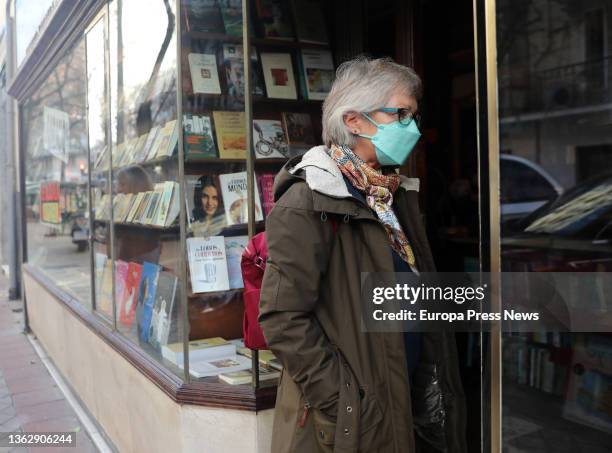 Woman enters the interior of the Pergamo bookstore on the day it closes on January 5 in Madrid, Spain. The bookstore was opened in 1945 by the...