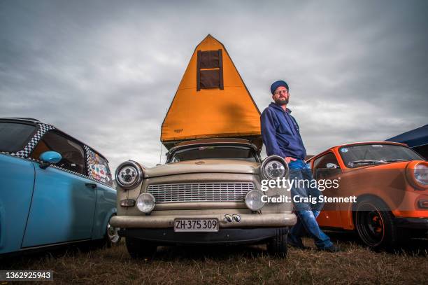 Andreas Liebezeit poses at the Trabant Club Zwickau annual gathering of Trabi owners on September 1, 2018 in Zwickau, Saxony, Germany. The engine for...