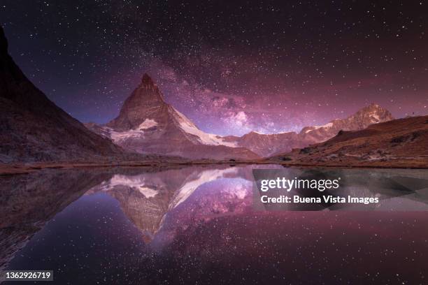 stars over the matterhorn - switzerland landscape stock pictures, royalty-free photos & images