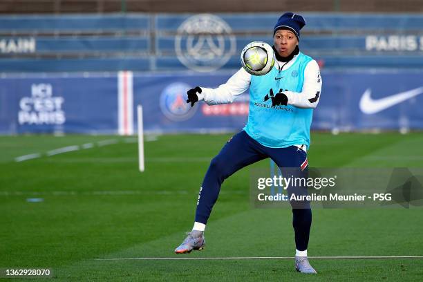 Kylian Mbappe controls the ball during a Paris Saint-Germain training session at Ooredoo Center on January 05, 2022 in Paris, France.