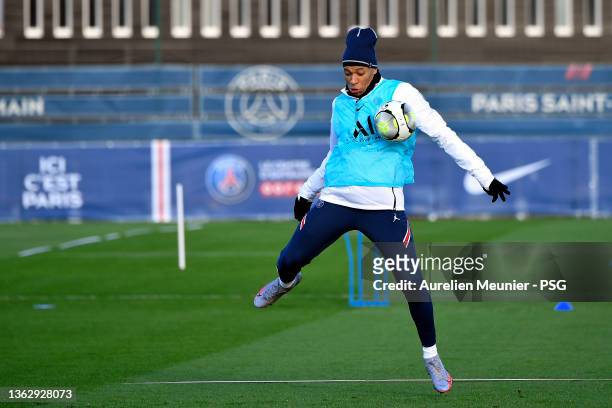 Kylian Mbappe controls the ball during a Paris Saint-Germain training session at Ooredoo Center on January 05, 2022 in Paris, France.