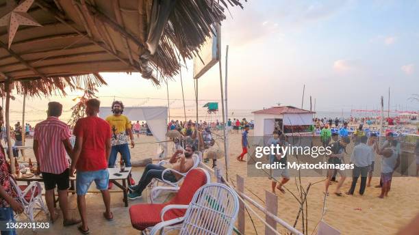 people celebrating new years eve in goa, india - goa nightlife stock pictures, royalty-free photos & images