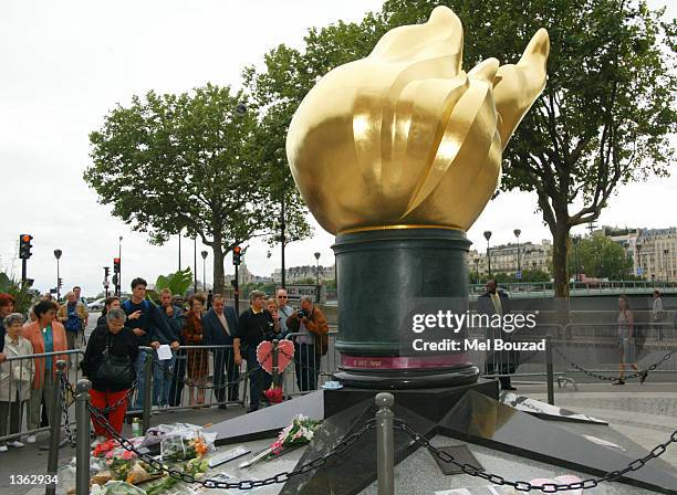 Fans pay tribute to the late Princess Diana of Wales on the fifth anniversary of her death on August 31, 2002 in Paris, France. The Princess died...