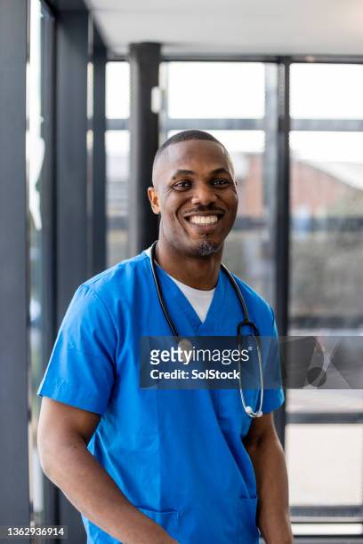 happy doctor - nhs england stock pictures, royalty-free photos & images