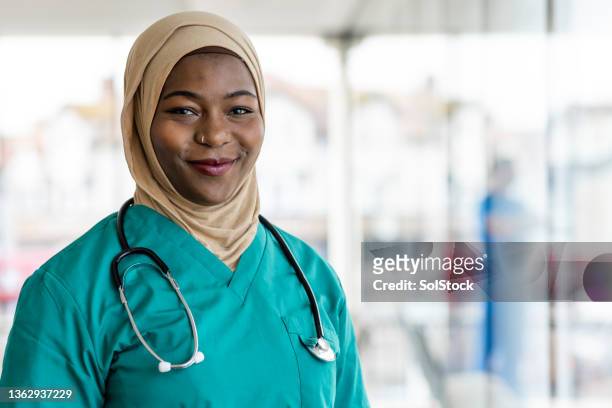 i love my job - hijab stock pictures, royalty-free photos & images