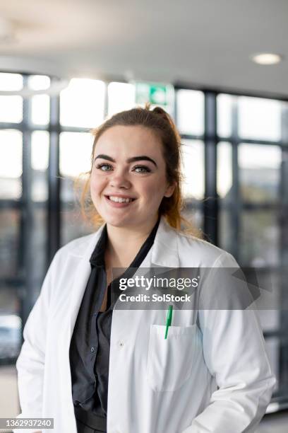 female doctor portrait - medium shot stock pictures, royalty-free photos & images