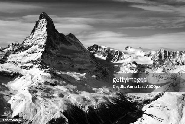 majestic proud,scenic view of snowcapped mountains against sky,switzerland - landscape black and white stock pictures, royalty-free photos & images