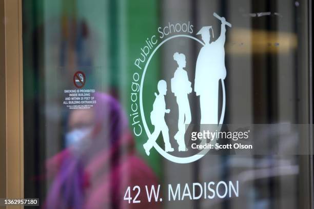 Sign is displayed at the entrance of the headquarters for Chicago Public Schools on January 05, 2022 in Chicago, Illinois. Classes at all of Chicago...