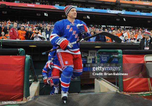 Darius Kasparaitis of the New York Rangers walks out for warm-ups prior to the start of the Alumni game against the Philadelphia Flyers on December...