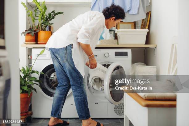 at home - laundry stockfoto's en -beelden