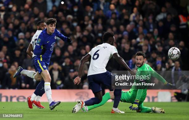 Kai Havertz of Chelsea scores their team's first goal past Hugo Lloris of Tottenham Hotspur during the Carabao Cup Semi Final First Leg match between...