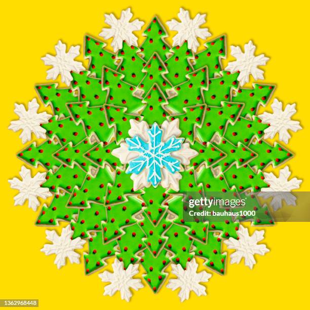 christmas tree and snowflake: christmas wreath created using festive decoratively iced christmas cookies - cookie decorating stock illustrations