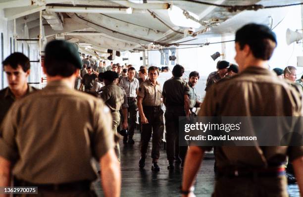 Royal Marines on board the SS Canberra, as it returns from the Falklands War, and docks in Southampton on July 11, 1982.