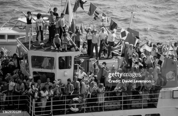 Flotilla of well wishers welcome the return of Royal Marines aboard the SS Canberra, as it docks in Southampton on July 11 on their return from the...