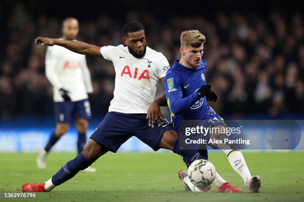 Timo Werner of Chelsea is challenged by Japhet Tanganga of Tottenham Hotspur during the Carabao Cup Semi Final First Leg match between Chelsea and...