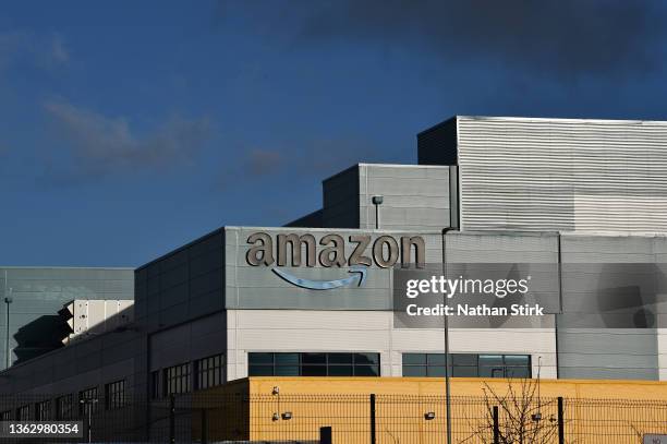 The Amazon logo is displayed outside the Amazon UK Services Ltd Warehouse on January 05, 2022 in Warrington, England.