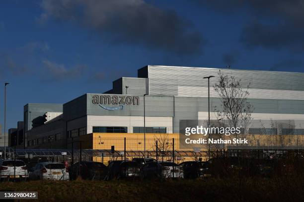 The Amazon logo is displayed outside the Amazon UK Services Ltd Warehouse on January 05, 2022 in Warrington, England.