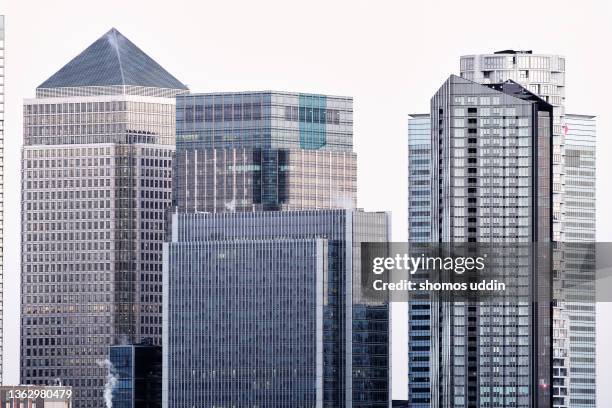 facade of modern architecture in london canary wharf - large office stock pictures, royalty-free photos & images