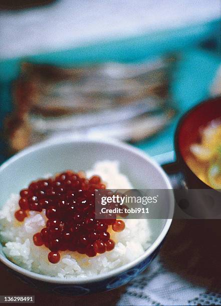 salmon caviar on rice - red caviar stock pictures, royalty-free photos & images