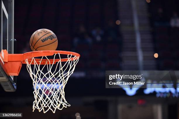 An official NBA ball falls into the hoop prior to the game between the Cleveland Cavaliers and the Memphis Grizzlies at Rocket Mortgage Fieldhouse on...