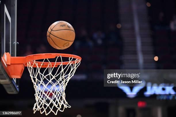 An official NBA ball falls into the hoop prior to the game between the Cleveland Cavaliers and the Memphis Grizzlies at Rocket Mortgage Fieldhouse on...