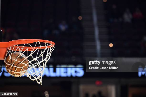 An official NBA ball falls into the hoop prior to the game between the Cleveland Cavaliers and the Memphis Grizzlies at Rocket Mortgage Fieldhouse on...