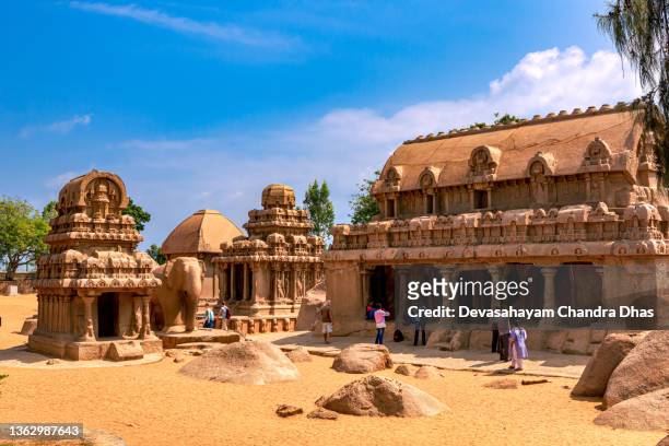 mahabalipuram, india - tourists at the one thousand three hundred year old pancha rathas - archaeology stock pictures, royalty-free photos & images