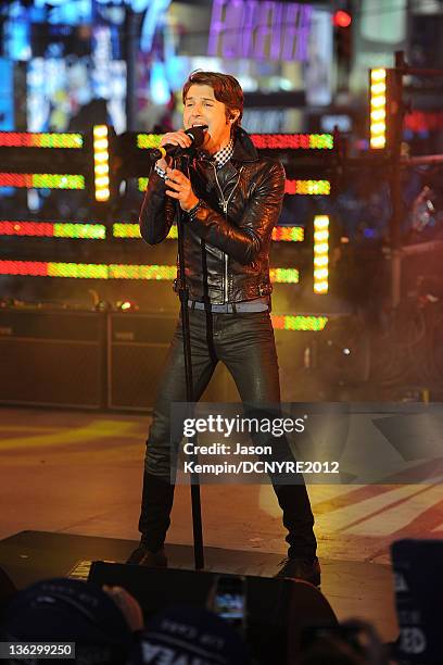 Singer Ryan Follese of Hot Chelle Rae performs onstage during Dick Clark's New Year's Rockin' Eve with Ryan Seacrest 2012 at Times Square on December...