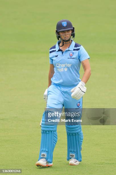 Hannah Darlington of the Breakers walks off after being caught off the bowling of Chloe Rafferty of the Meteors during the WNCL match between ACT...
