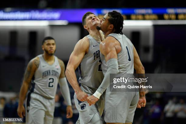 John Harrar and Seth Lundy of the Penn State Nittany Lions celebrate in the second half after scoring against the Northwestern Wildcats at Welsh-Ryan...