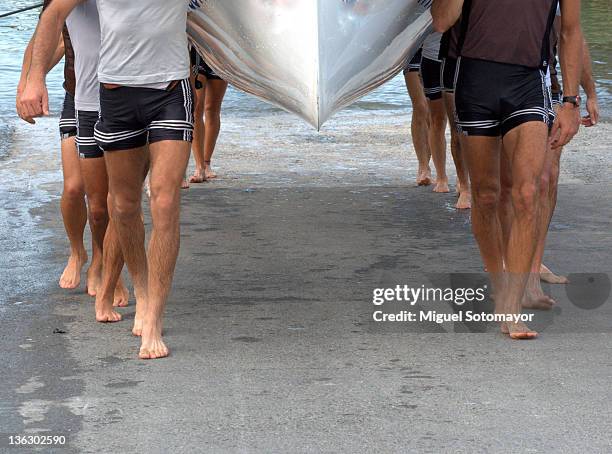 traineras holding boat for boat race - basque fotografías e imágenes de stock