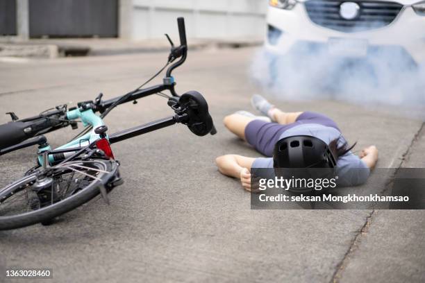 road accident. car and bicycle - gory car accident fotos stock-fotos und bilder