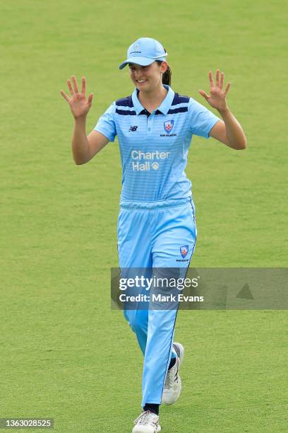 Stella Campbell of the Breakers is clapped off the pitch after taking seven wickets during the WNCL match between ACT Meteors and NSW Breakers at...