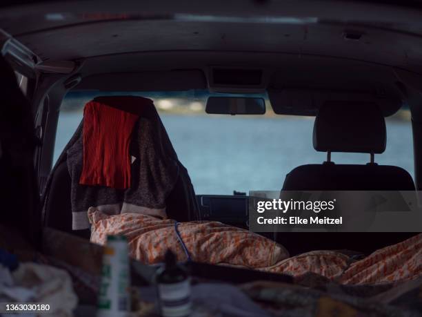 van life - messy car interior stock pictures, royalty-free photos & images