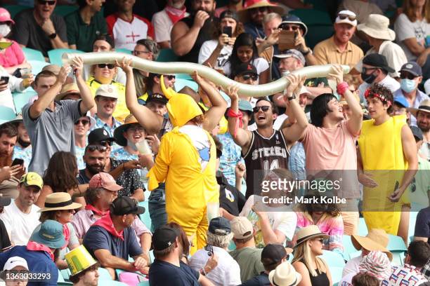 Fans create a beer snake during day two of the Fourth Test Match in the Ashes series between Australia and England at Sydney Cricket Ground on...