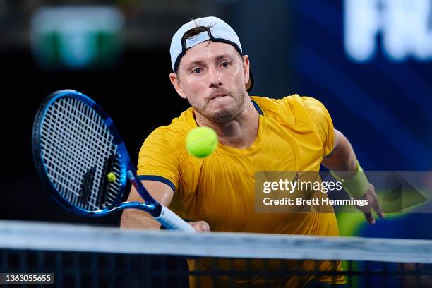 James Duckworth of Australia plays a backhand shot in his group B match against Arthur Rinderknech of France during day six of the 2022 Sydney ATP...