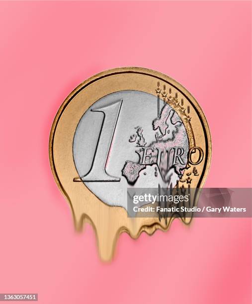 concept image of euro coin melting depicting the loss in value of the currency - european union coin stock illustrations