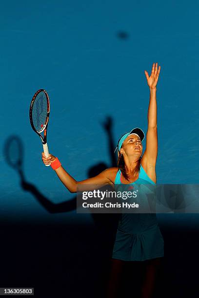 Daniela Hantuchova of Slovak serves during her match against Dominika Cibulkova of Serbia during day one of the 2012 Brisbane International at Pat...