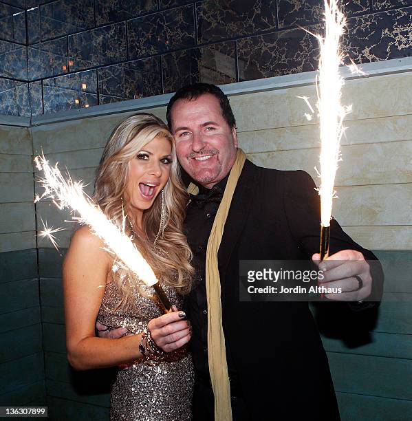 Alexis Bellino and husband Jim celebrate New Years Eve during the Alexis Bellino and Tamara Barney Host - CIROC The New Year 2012 at Beverly Club on...