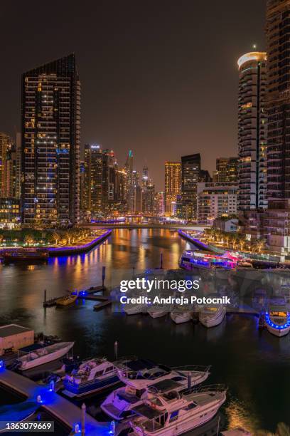 dubai marina at dusk - recreational boat stock pictures, royalty-free photos & images