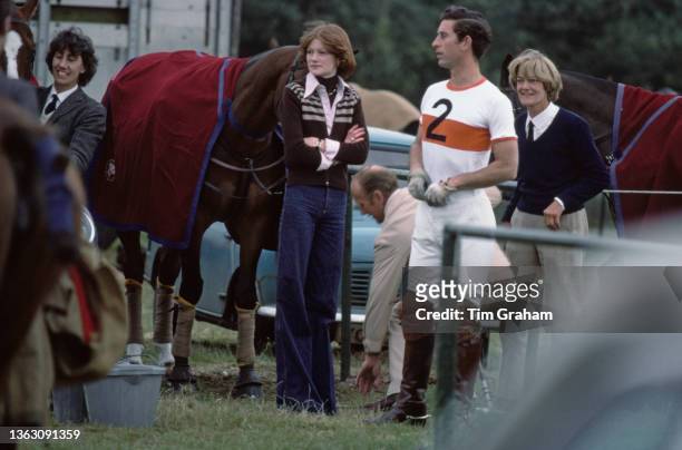 Prince Charles, the Prince of Wales and Sarah Spencer at a polo match, UK, July 1977. Sarah is the sister of Lady Diana Spencer, Charles's future...