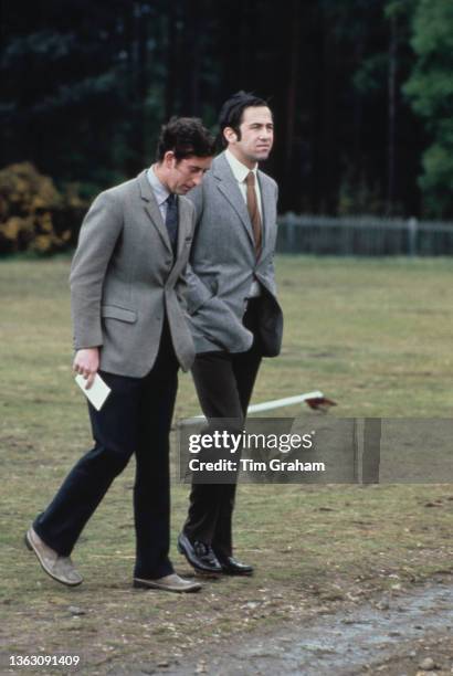 Prince Charles, the Prince of Wales with the exiled King Constantine of Greece in Windsor Great Park, UK, May 1974.